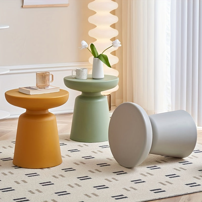 Creative Round Coffee Table for Small Apartments, Suitable for Living Rooms, Featuring a Plastic Design That Complements Corner Sofas.