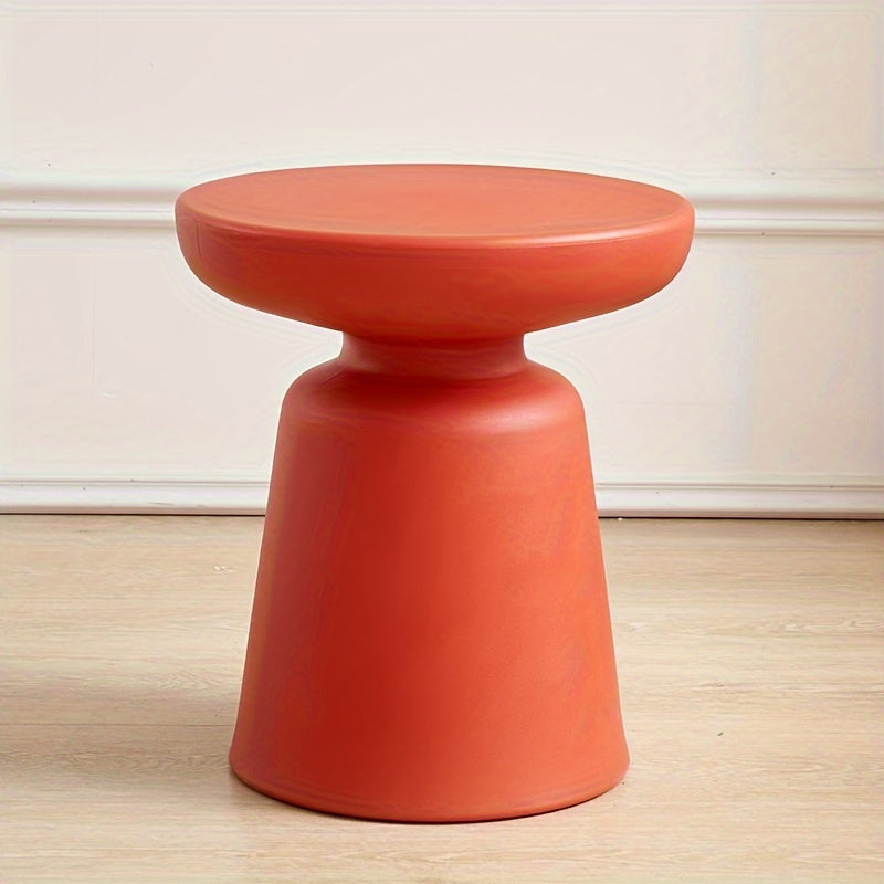 Creative Round Coffee Table for Small Apartments, Suitable for Living Rooms, Featuring a Plastic Design That Complements Corner Sofas.