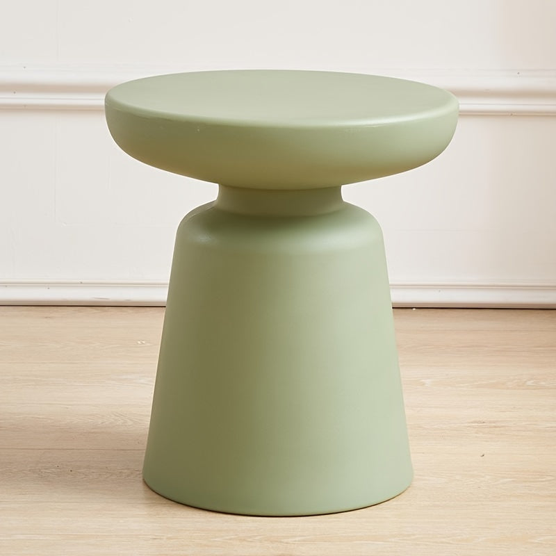 Creative Round Coffee Table for Small Apartments, Suitable for Living Rooms, Featuring a Plastic Design That Complements Corner Sofas.