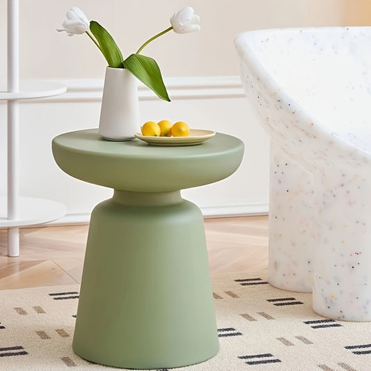 Creative Round Coffee Table for Small Apartments, Suitable for Living Rooms, Featuring a Plastic Design That Complements Corner Sofas.